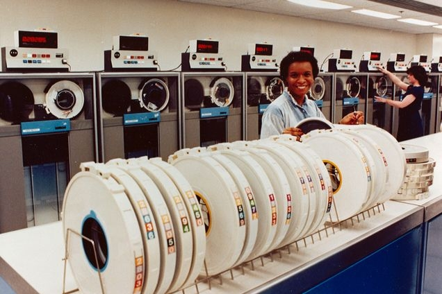 Shown here are Bureau personnel in the mid-1970s managing the computer storage tapes that contained all NCIC records and transaction logs. This legacy system required operator intervention to ensure that tapes were effectively maintained.